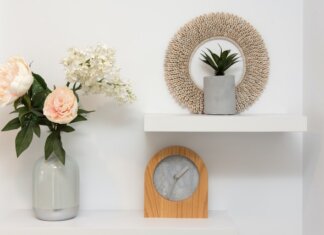 Ways To Create More Storage Space In Your Home DECORATION DISPLAYED ON WHITE SHELVES.